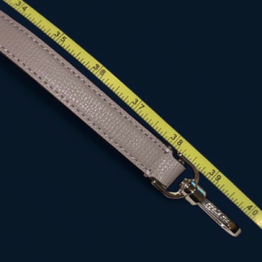 Kate Spade Cream Leather Strap with Silver Hardware